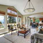 Vaulted,Ceiling,Living,Room,With,Large,Windows,Overlooking,Beautiful,View,